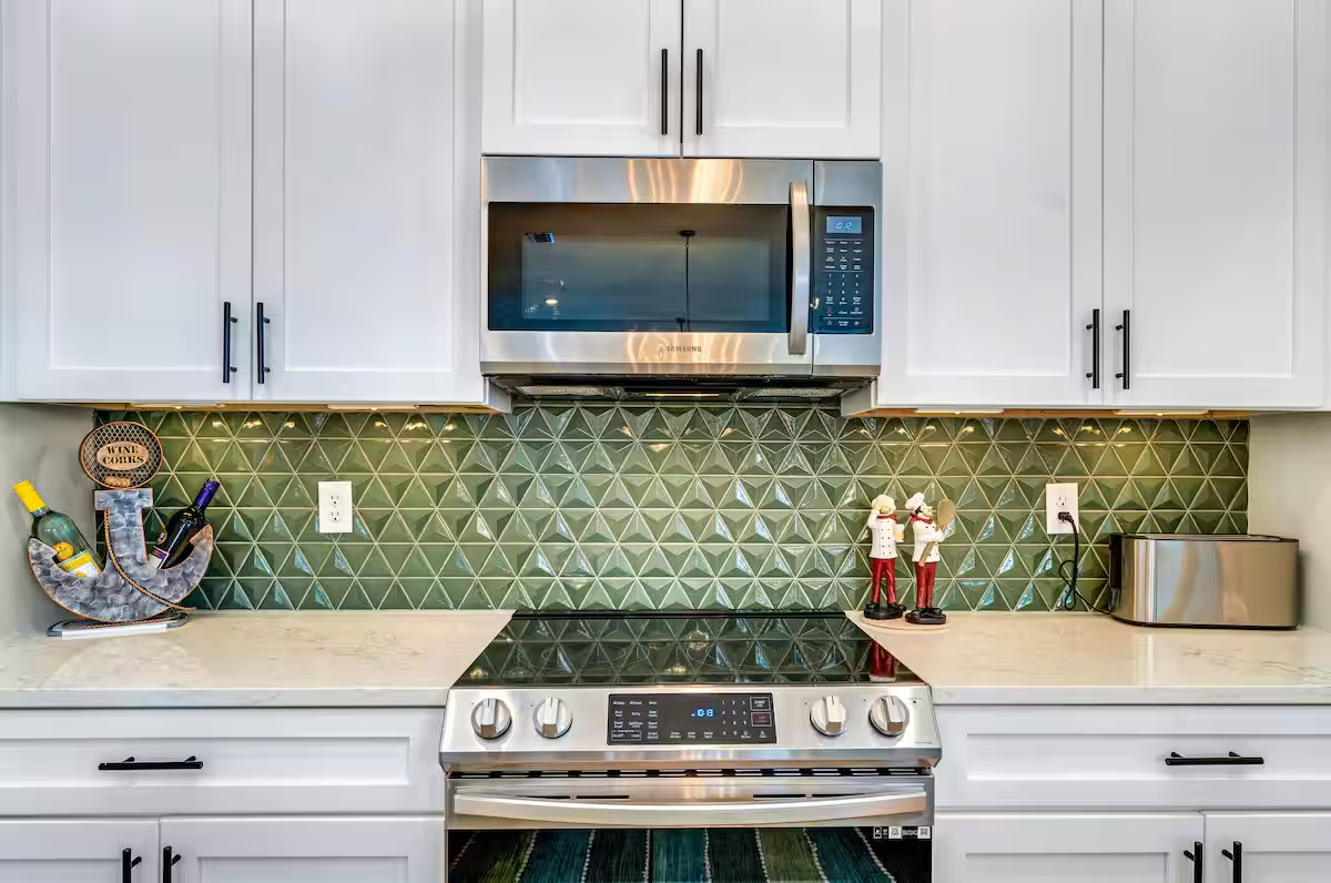 Cook, gather, and entertain with ease in the fully stocked kitchen, complete with all major appliances and everything you need for effortless coastal dining.