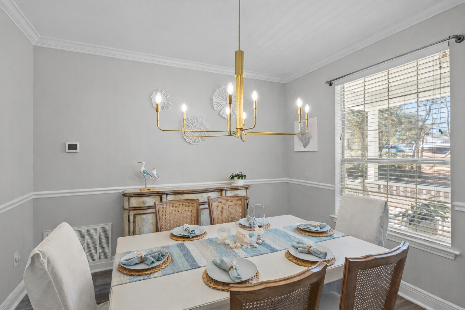 Coastal dinners, card games, or morning mimosas — the heart of the cottage is ready for memories.