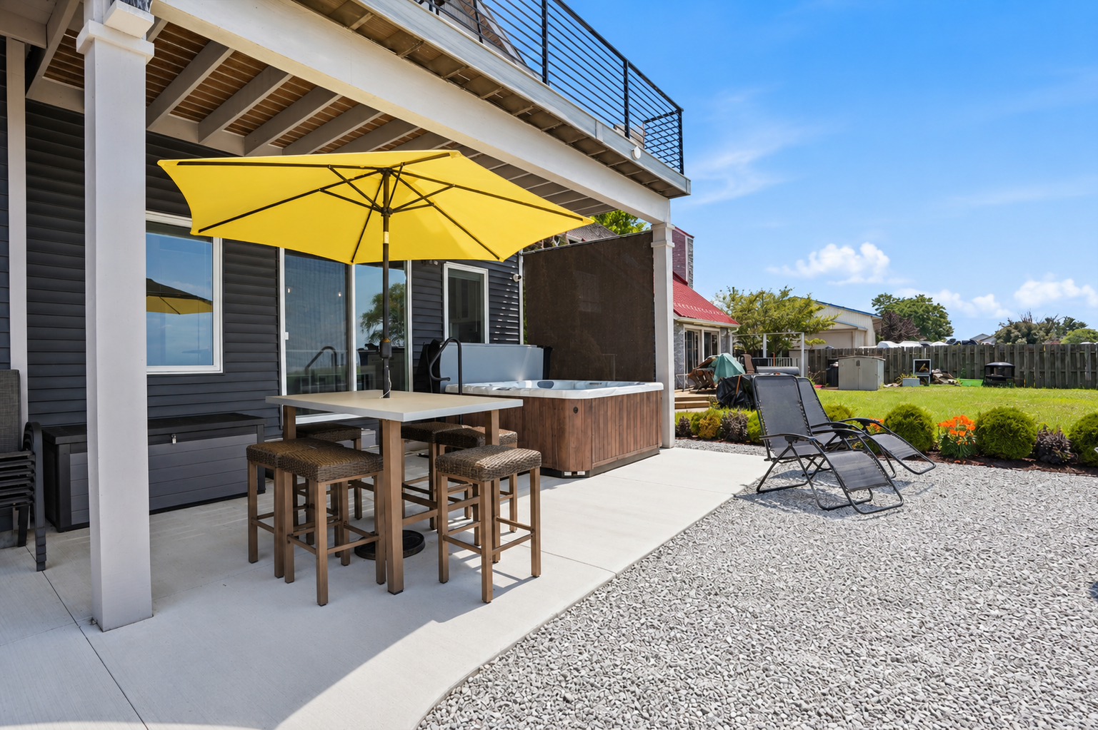 Dine outdoors under the umbrella, fire up the propane grill, unwind in the private hot tub, or stroll next door to Cabana Blue Lakefront Sports Bar & Grill for waterfront dining just steps away.