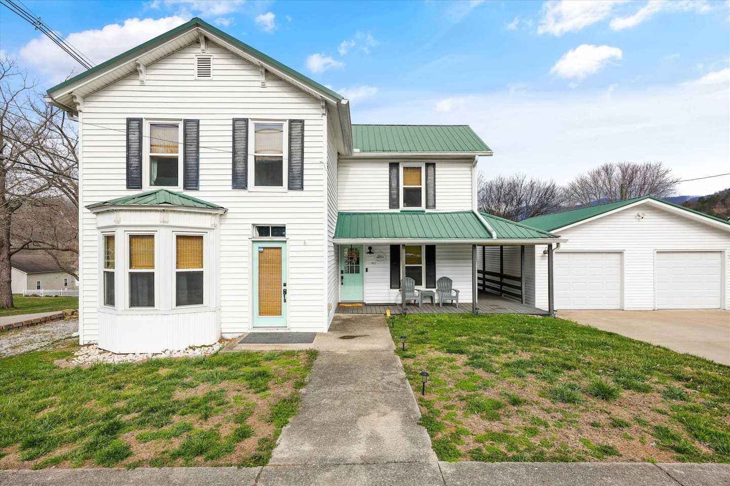 Restored Victorian historic 1890's home with over 2200 sq ft of living space with usable 2 car garage.