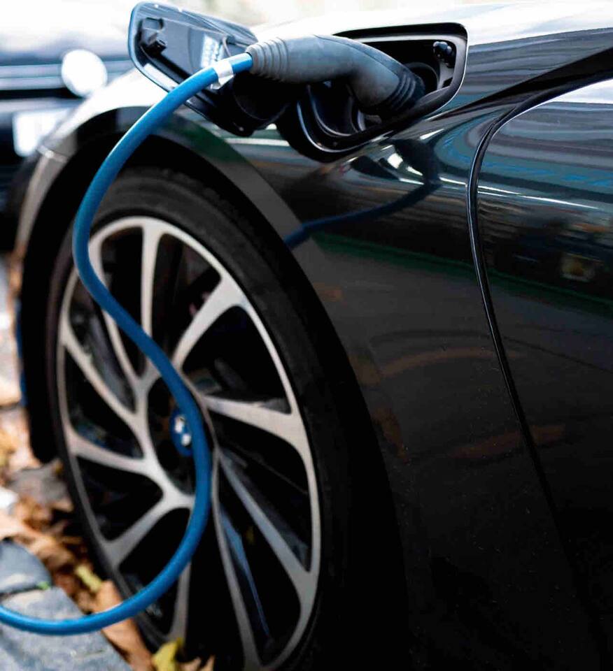 In the garage - this home has a standard J1772 plug for home charging. This charging station provides juice to an onboard charger rated at 11.5 kW to add 25 to 30 miles of range in an hour.