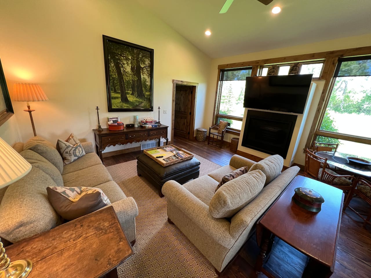 Living room with gas fireplace and Roku enabled TV 