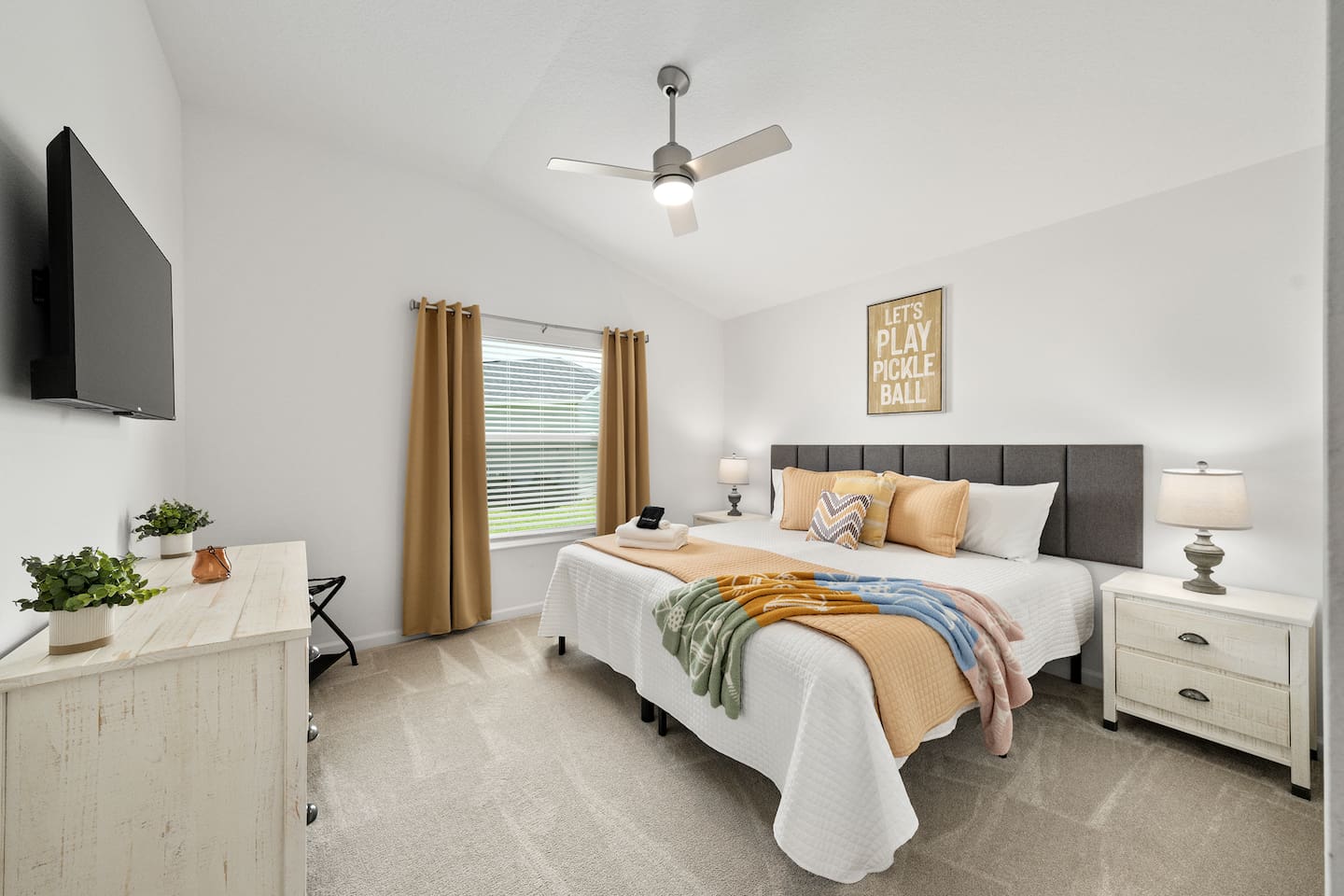 A cozy and colorful room that can either be a king bed or two twins.