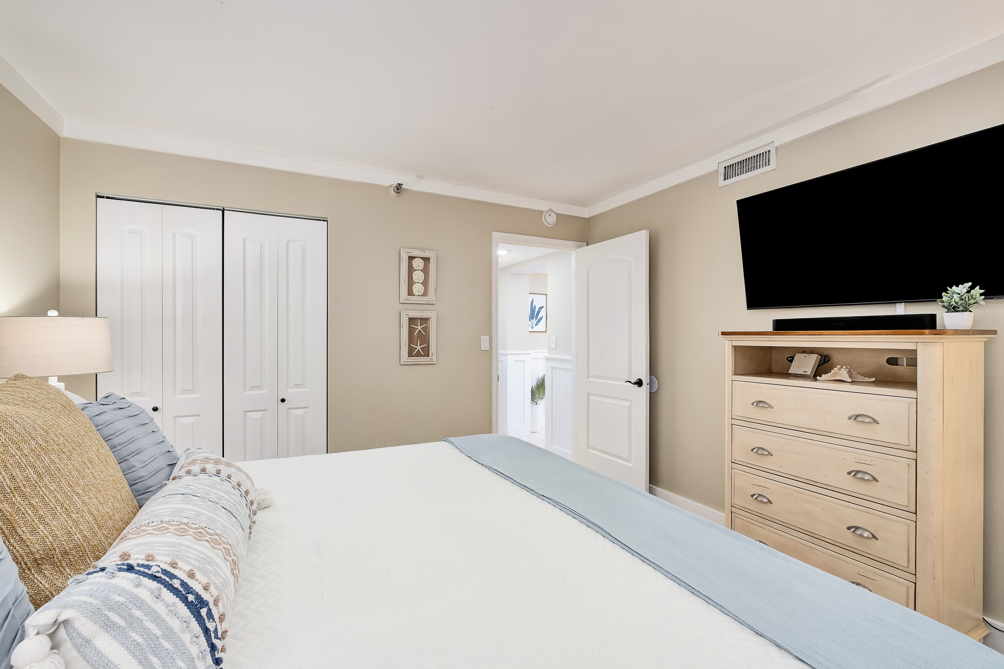 Bedroom #2 - Tuck yourself to sleep by watching your favorite show on a 55" TV straight from the bed.