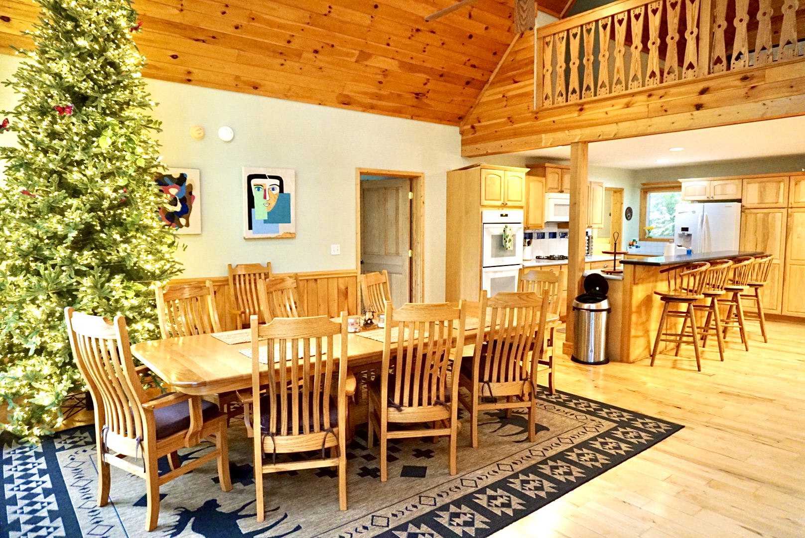 Spacious table under warm wood beams—perfect for great meals and memories!
