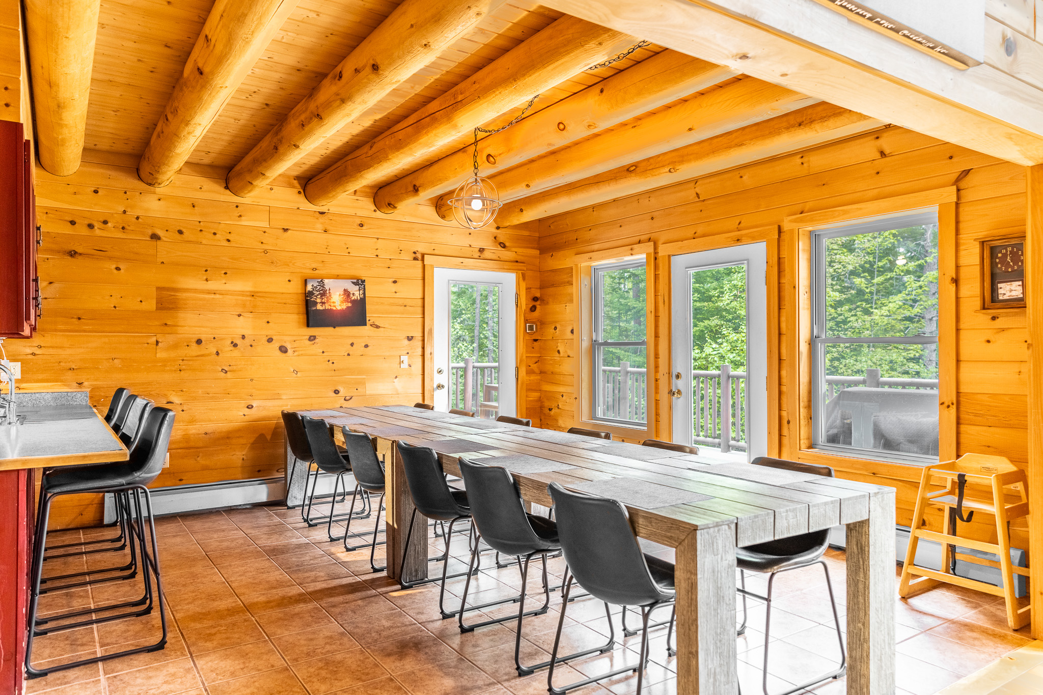 Expansive dining table seats 12 people plus 4 at the kitchen counter. We never forget the littles! Optional infant high chair for the dining area, and that's one less thing to have to pack. The kitchen is also equipped with some children's plate sets.