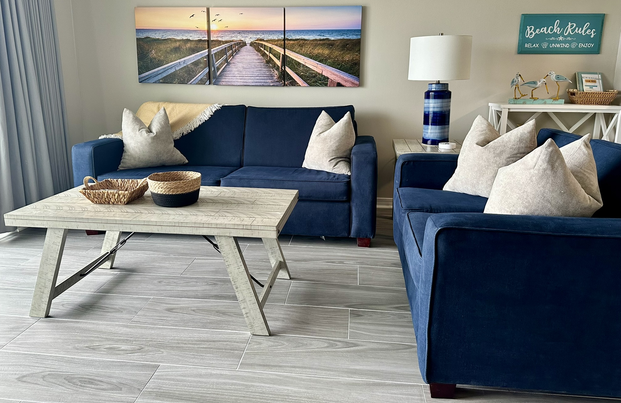 Luxury tile underfoot across the entire condo