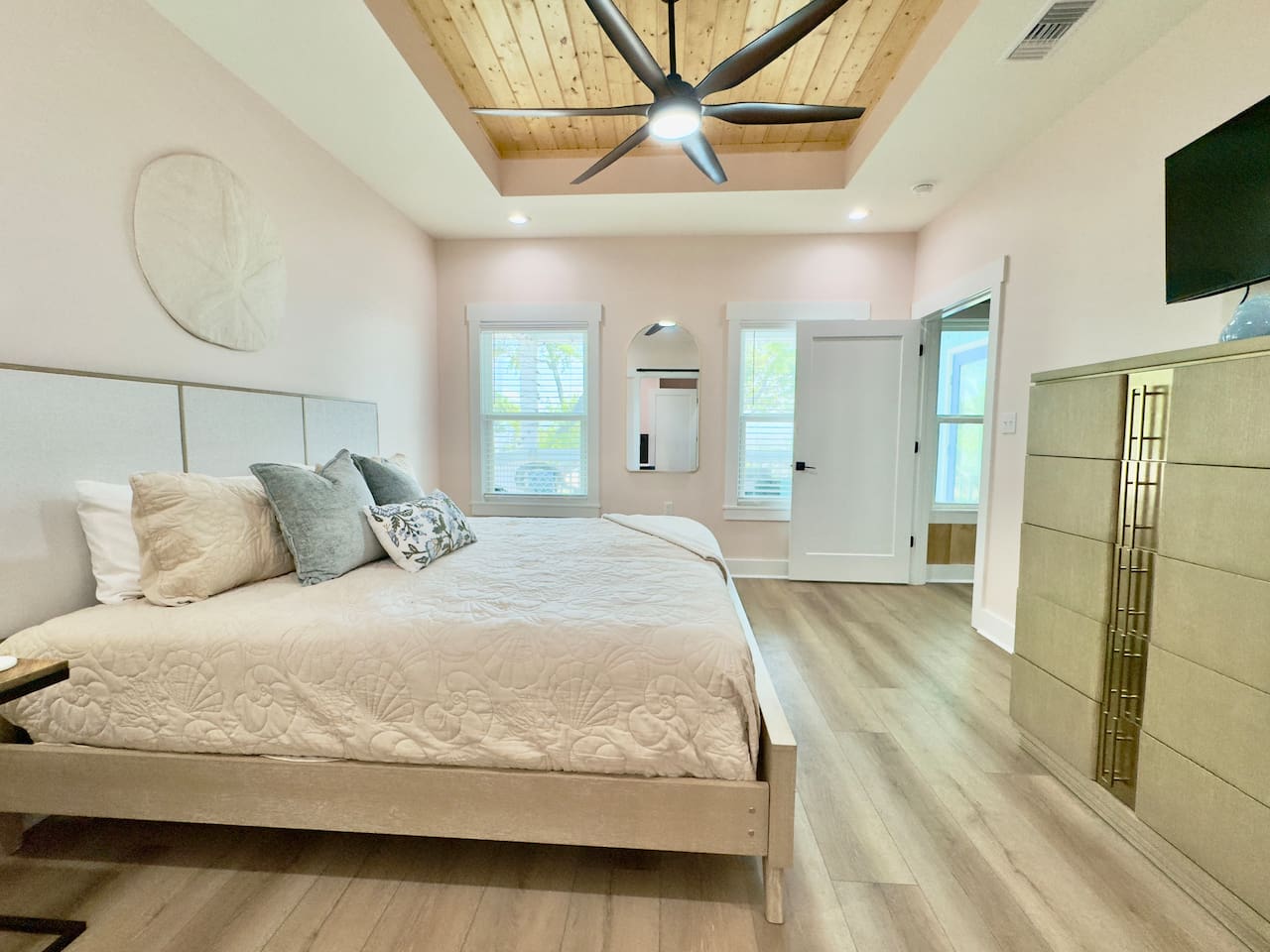 This bright room offers comfort with a touch of elegance.