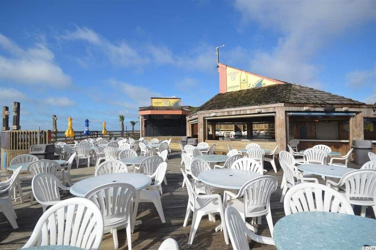 Sun-soaked days await by the pool and oceanfront bar!