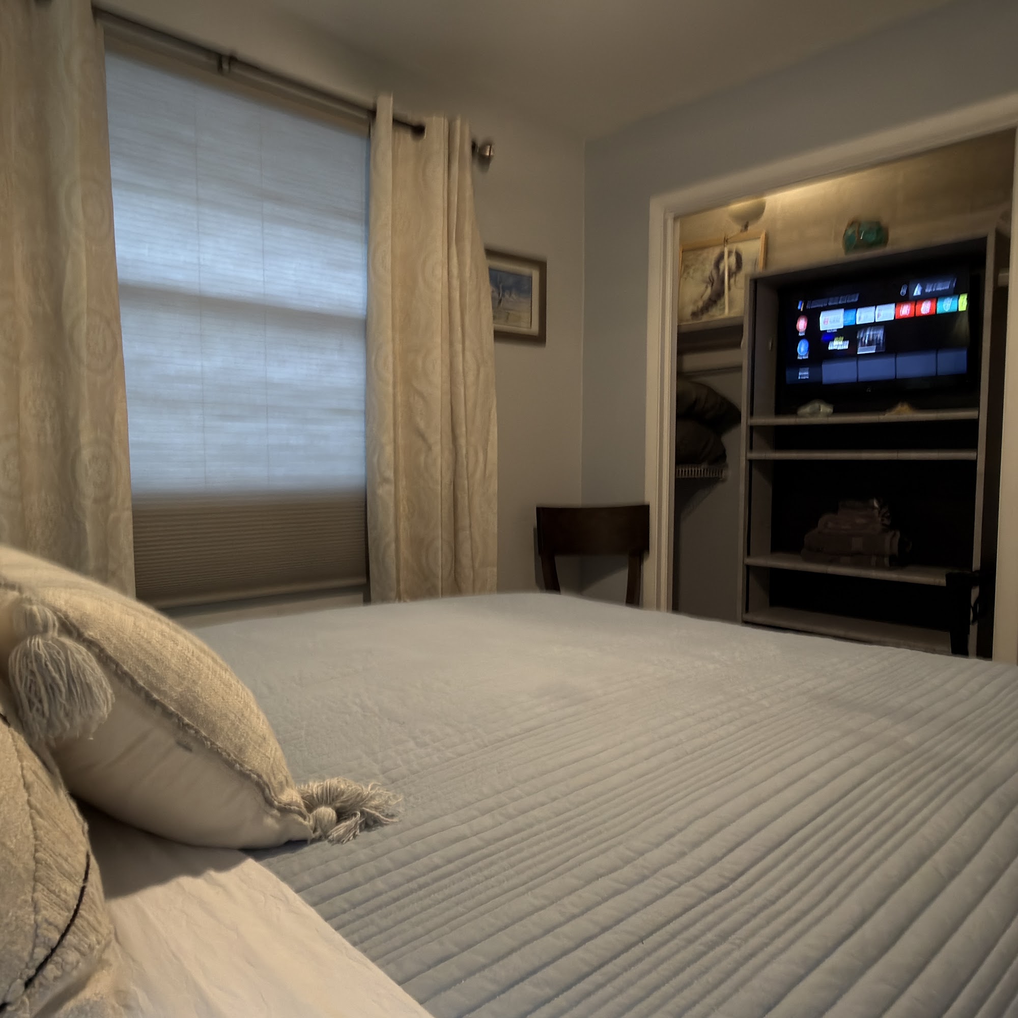 Bedroom 3: queen bed and closet TV