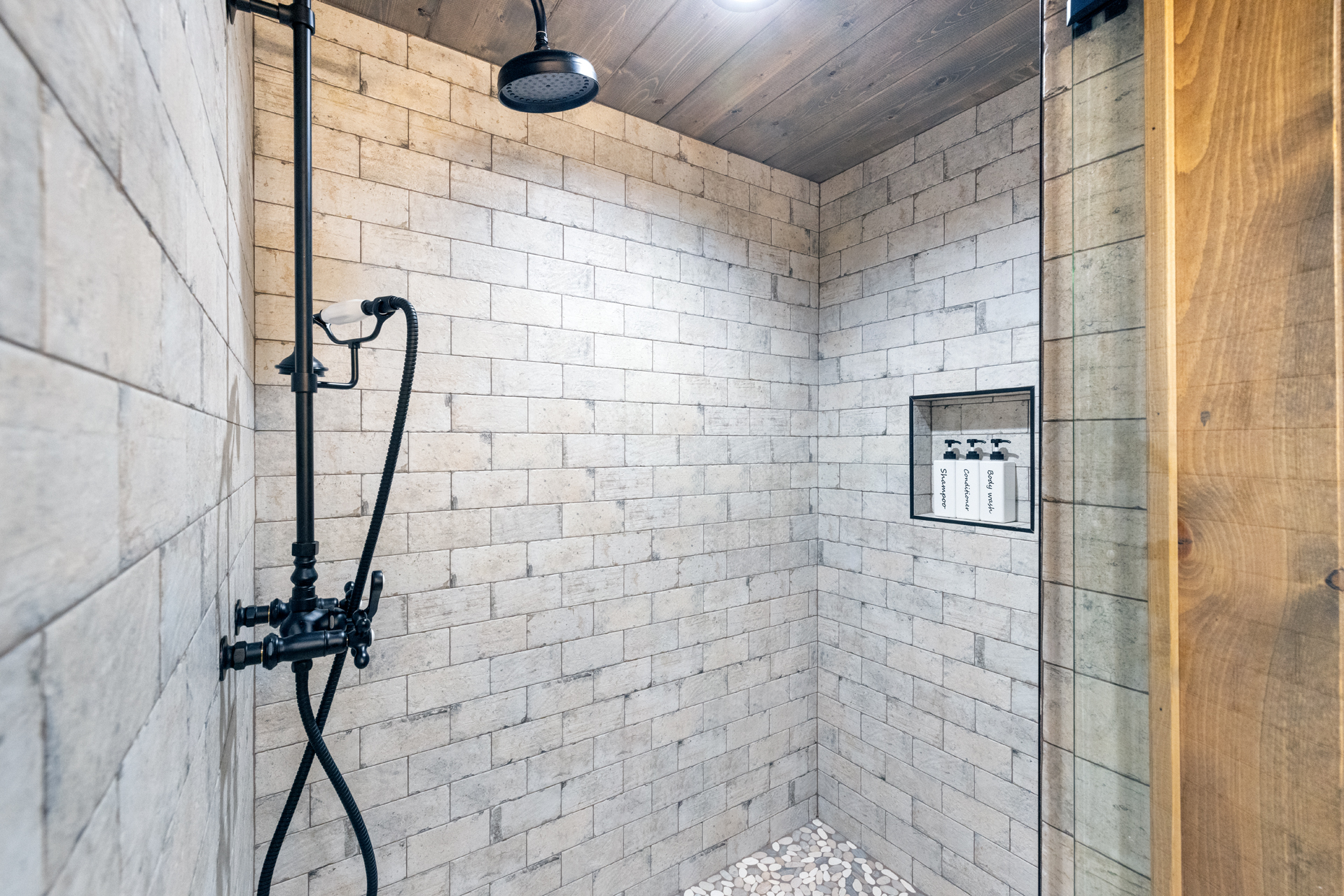 Walk-in shower with modern tilework and spa-inspired ambiance
