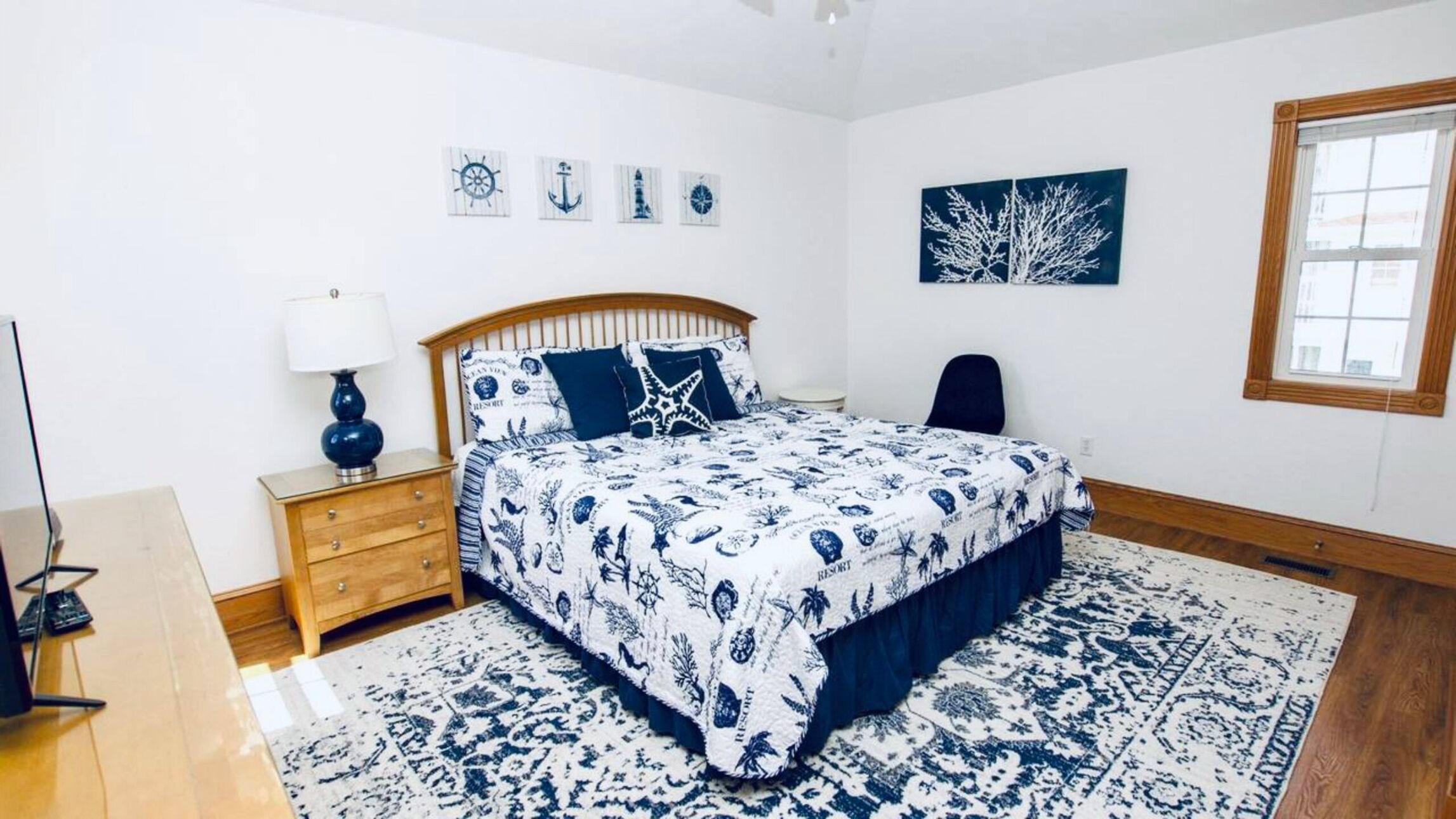 Bedroom  - King Master - Tranquil with a blue and white color scheme.