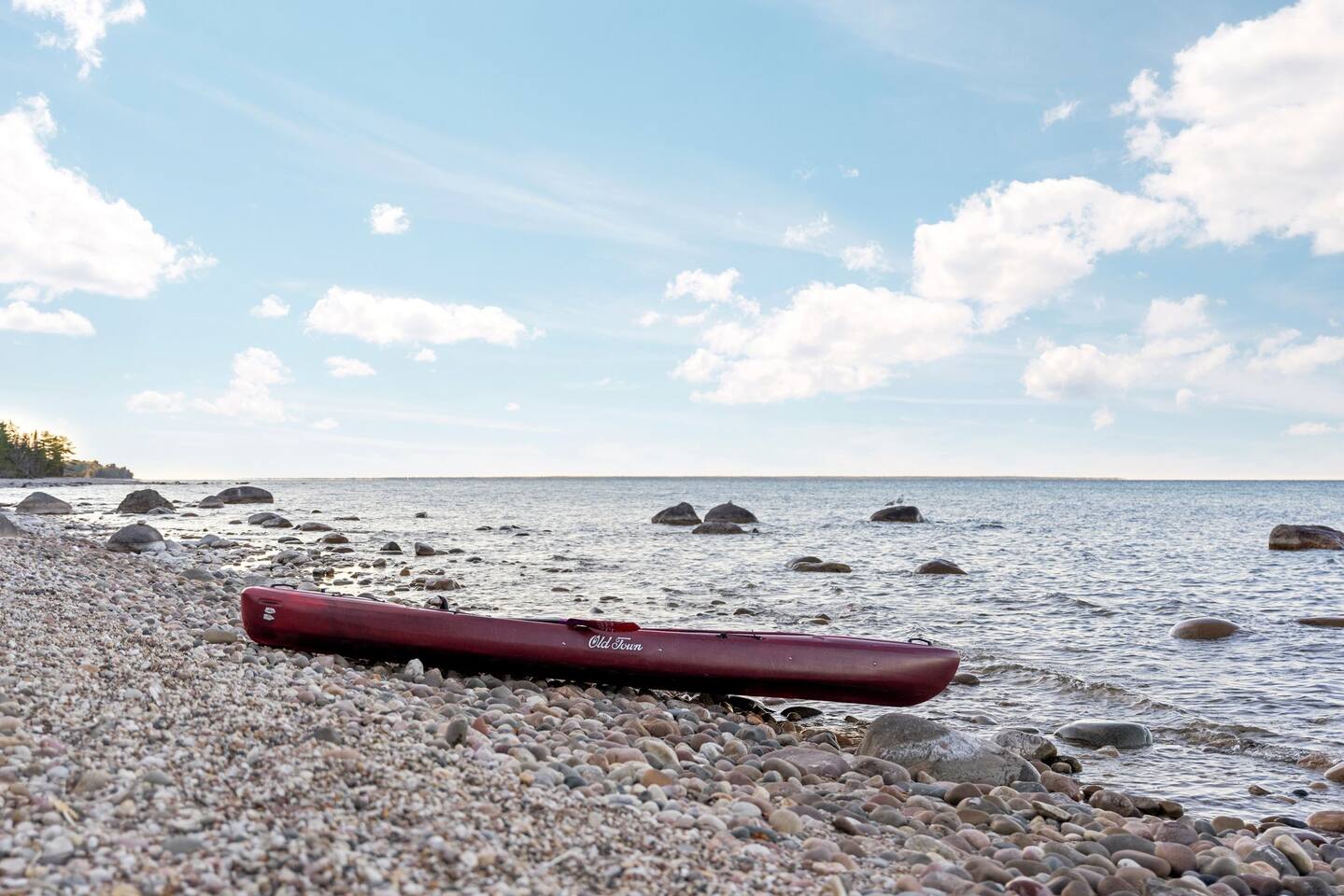 Beach area with one of the provided kayaks