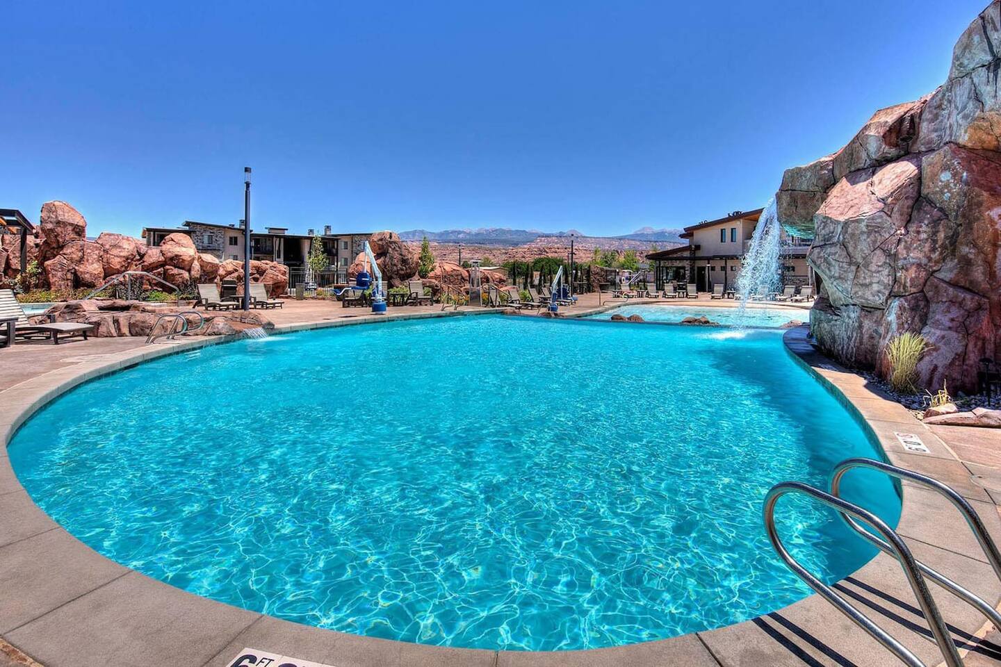 Pool area with water fall to enjoy