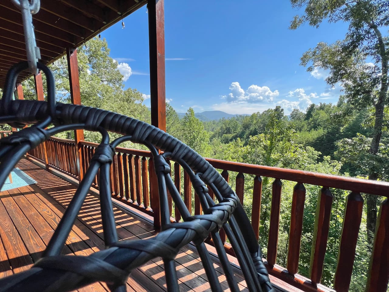 Enjoy a swing in our 2 hanging porch chairs & savor the scenery