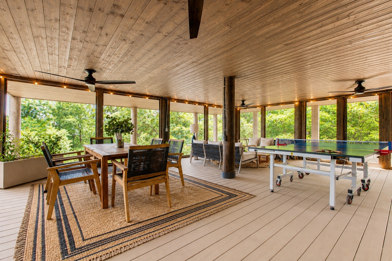 Weather won't bother you down here! Relax and enjoy each others company in this screened in porch with Ping Pong!