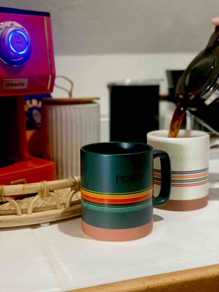 Drip coffee maker, coffee, filters and sugar provided. 