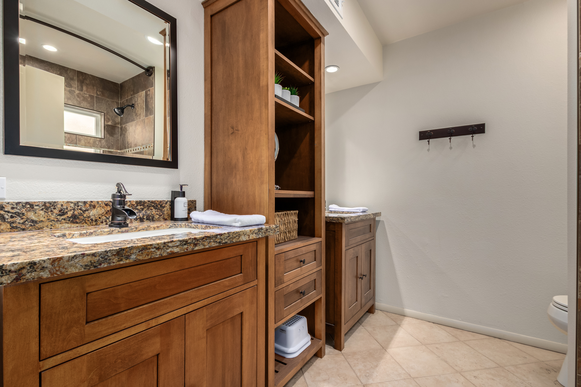 hall bath- tub/shower combo w/ dual vanity