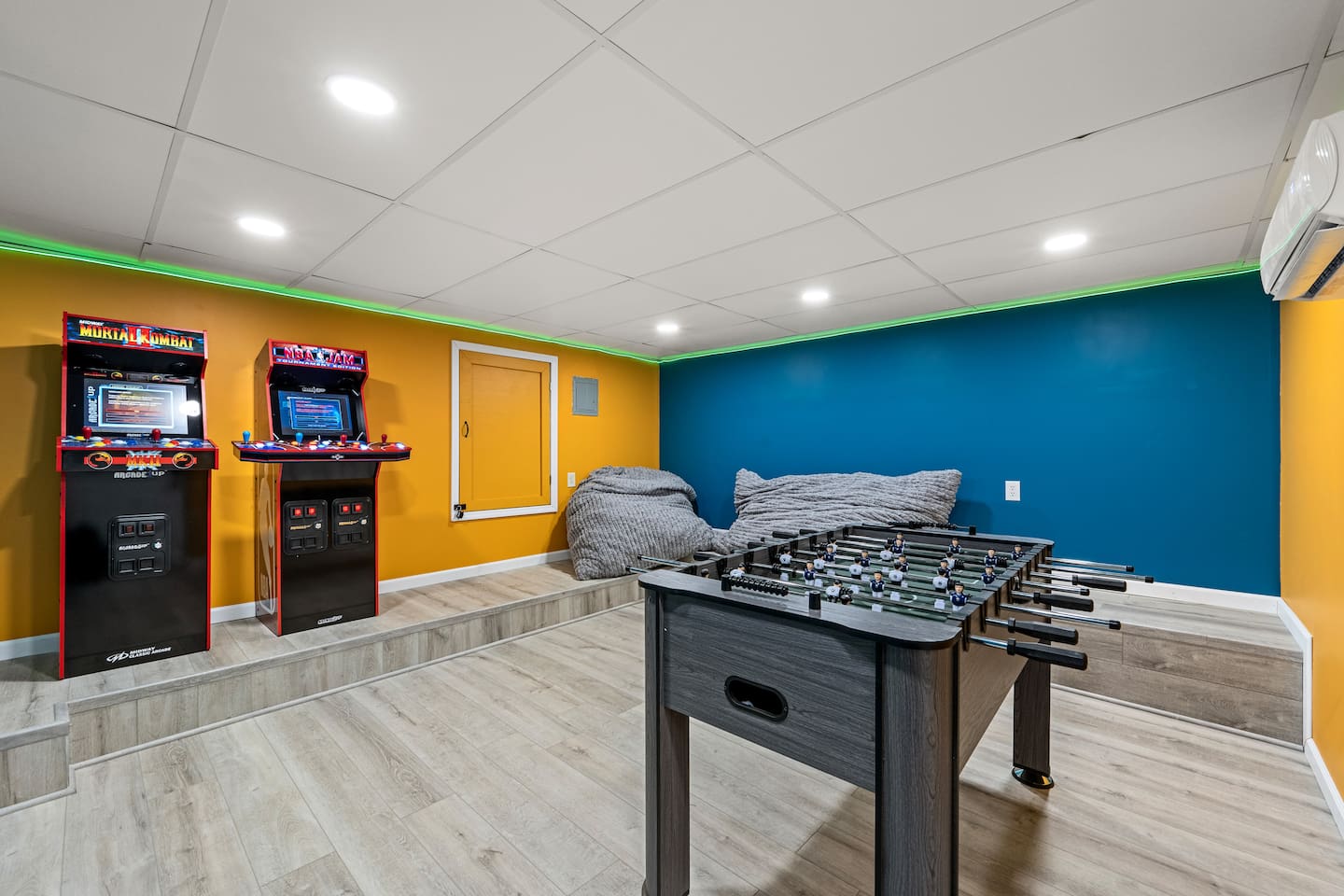 Downstairs game room.  Plenty of space for a whole group to hang out with the oversized bean bag chairs.