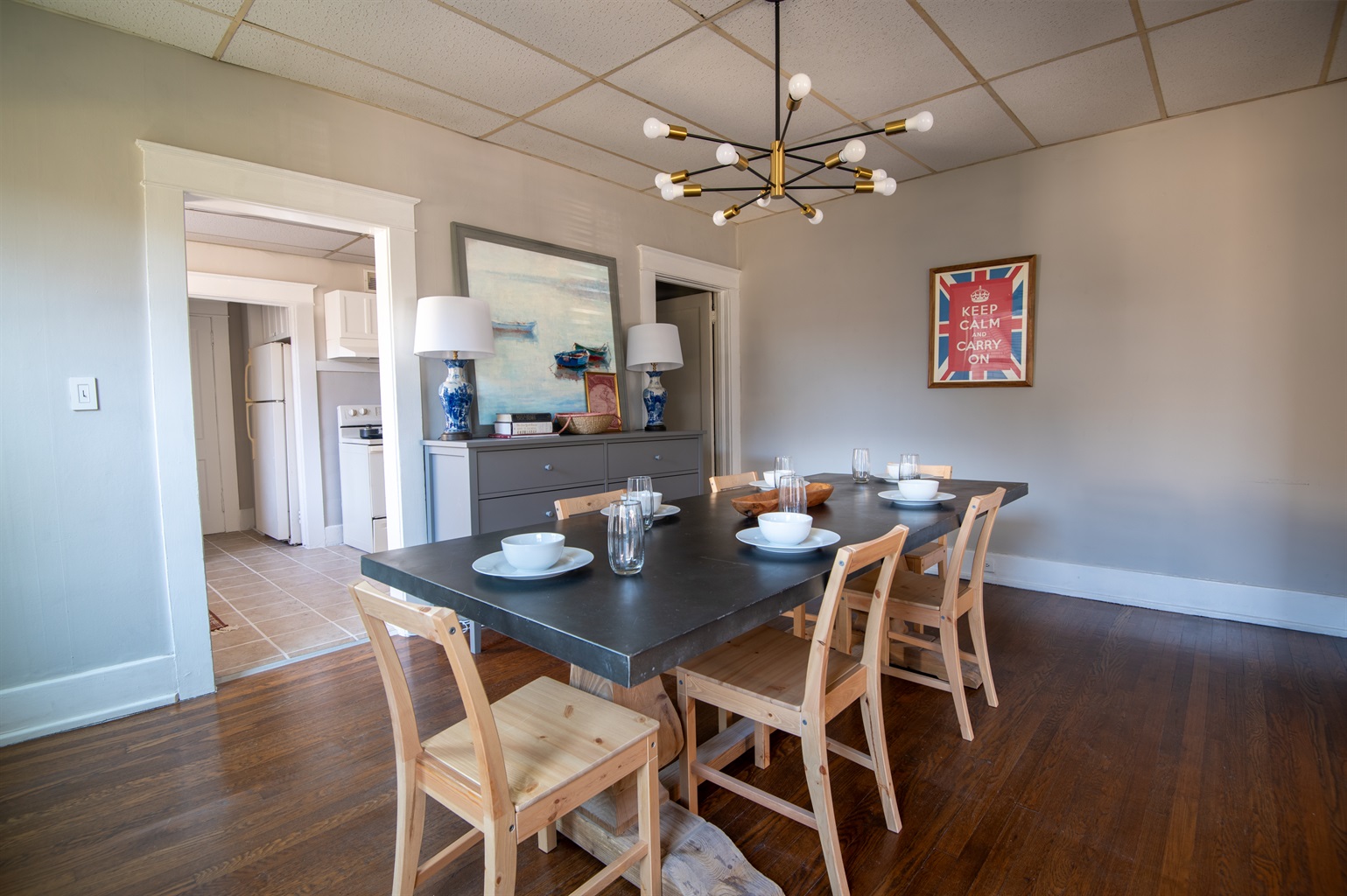 Contemporary dining area perfect for gatherings, with stylish seating and kitchen access.
