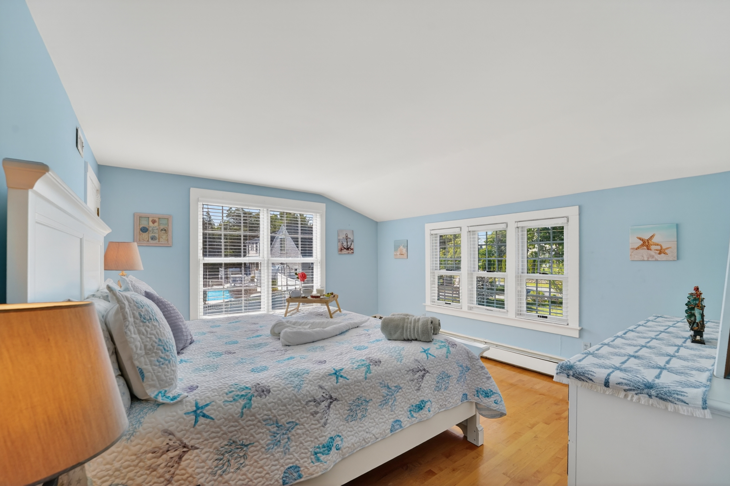 Spacious bedroom with multiple beds, making it a great option for families or groups traveling together.
