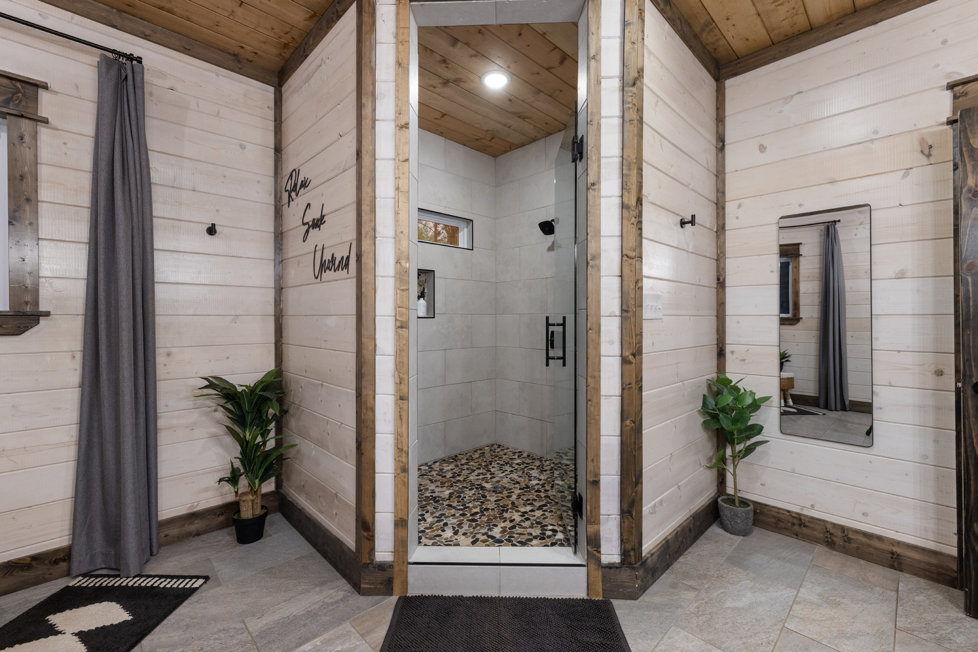 Step into the oversized walk-in shower with dual showerheads for one more spa-like touch before heading out to explore or staying right here all day.