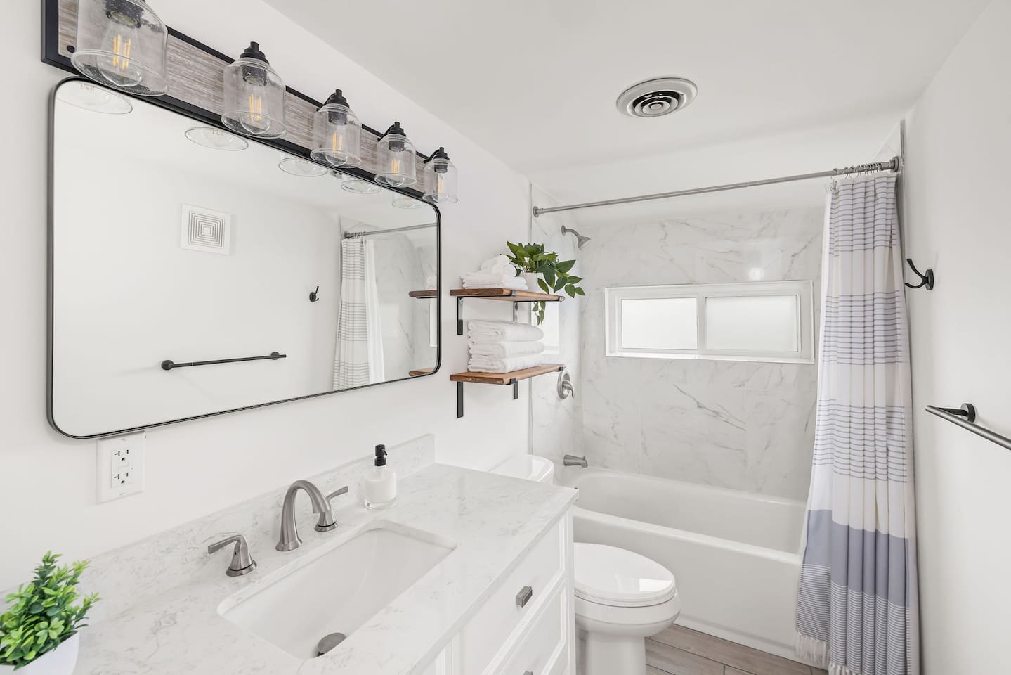 Bathroom #1 downstairs

Located just off the getting-ready room (with Murphy bed) and living room