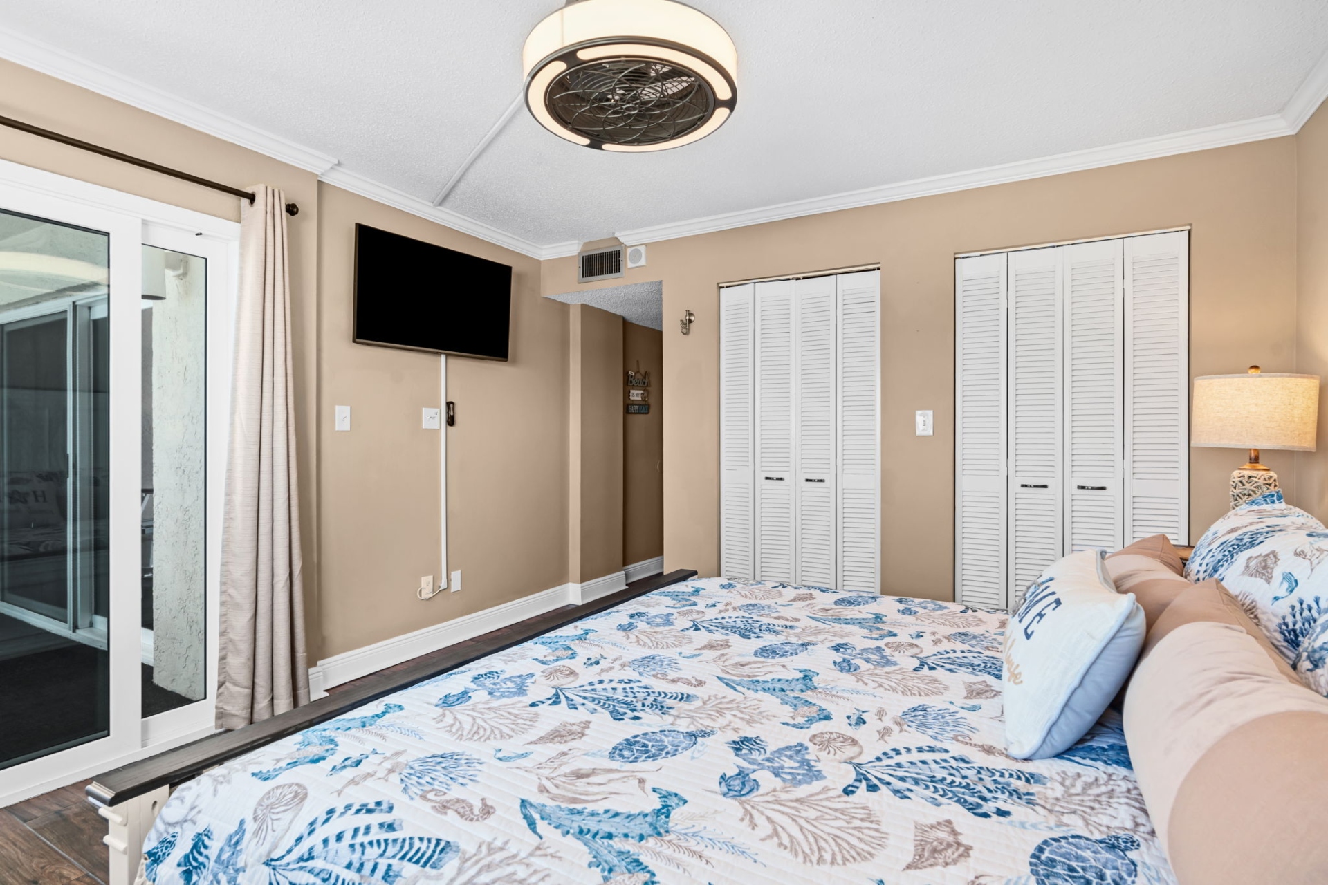 Master bedroom has a king bed, smart TV and ample clothing storage