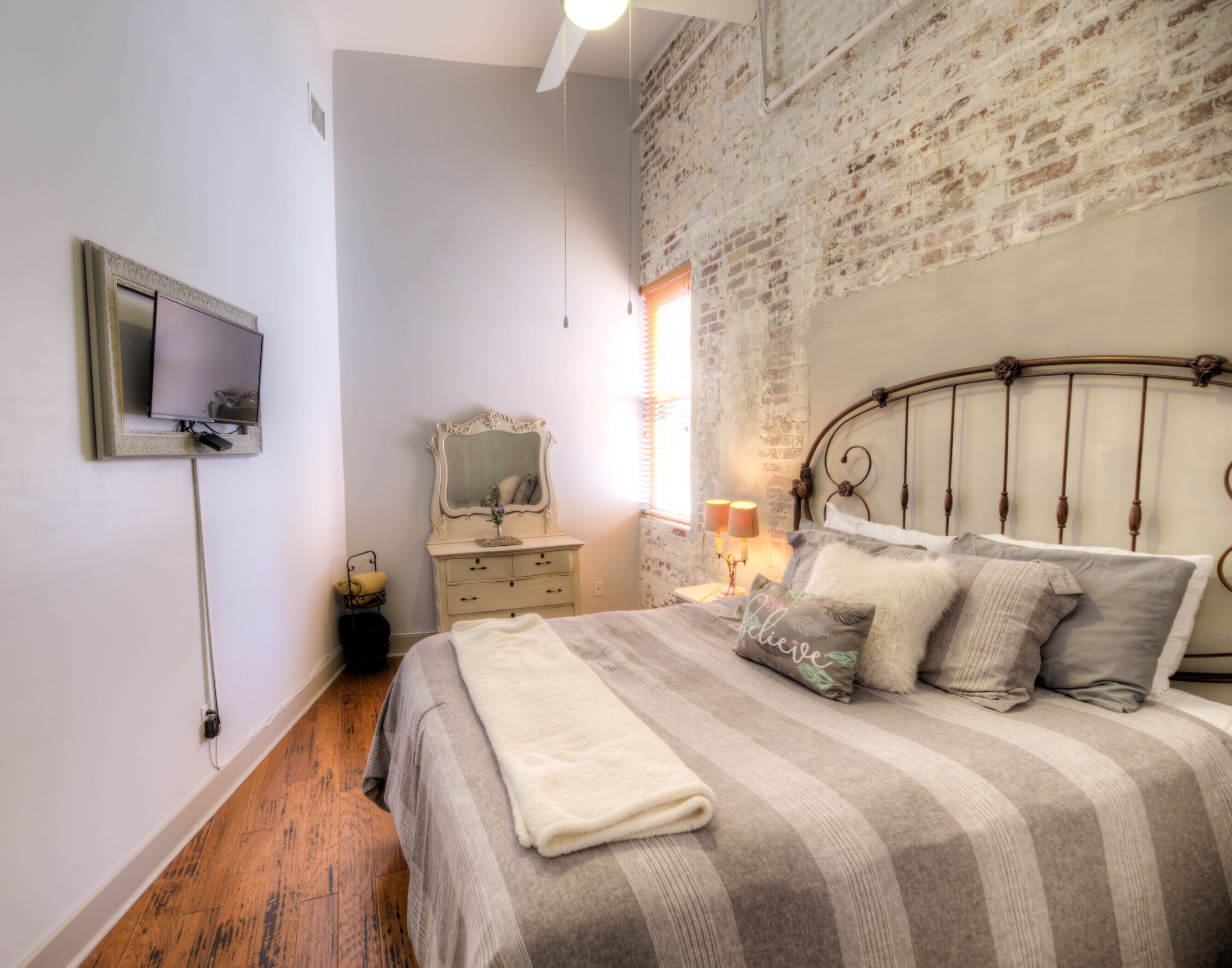 QN bed, flat screen TV, dresser. Bath, laundry, dressing room located en suite.