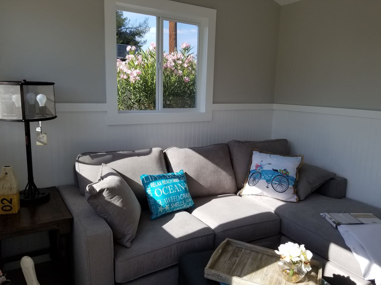 Backyard Garden Room – Comfortable private room with mini-split, TV, and workspace. Sleeps 1.