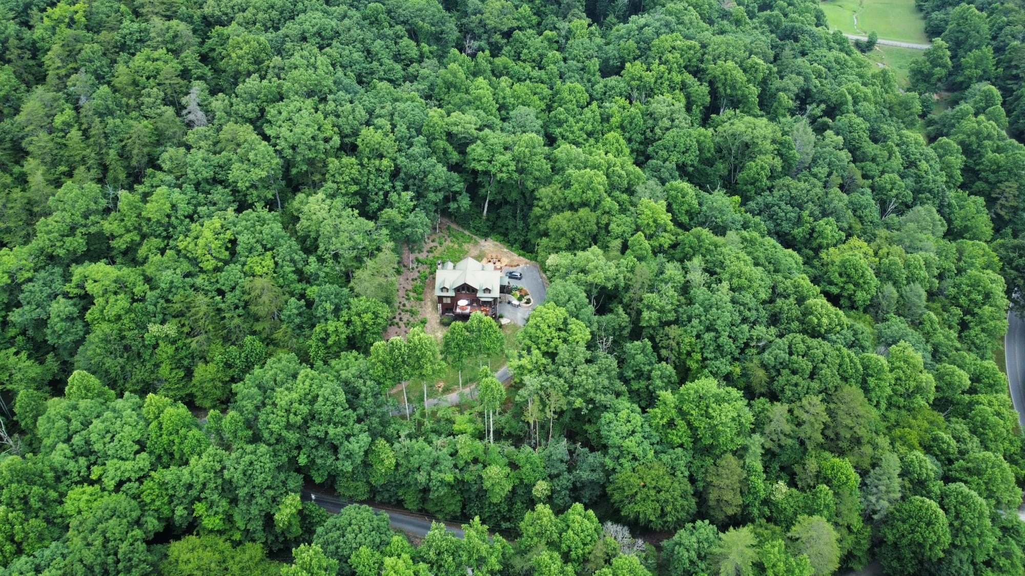 Secluded on 9 acres with private hiking trails.