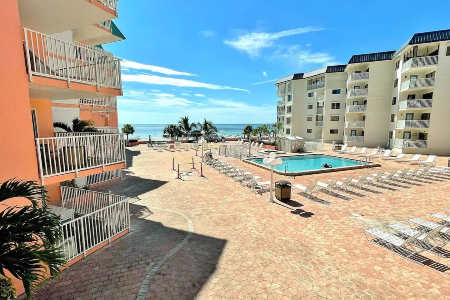 Heated Pool open year round with ample seating, overlooking Gulf of Mexico.