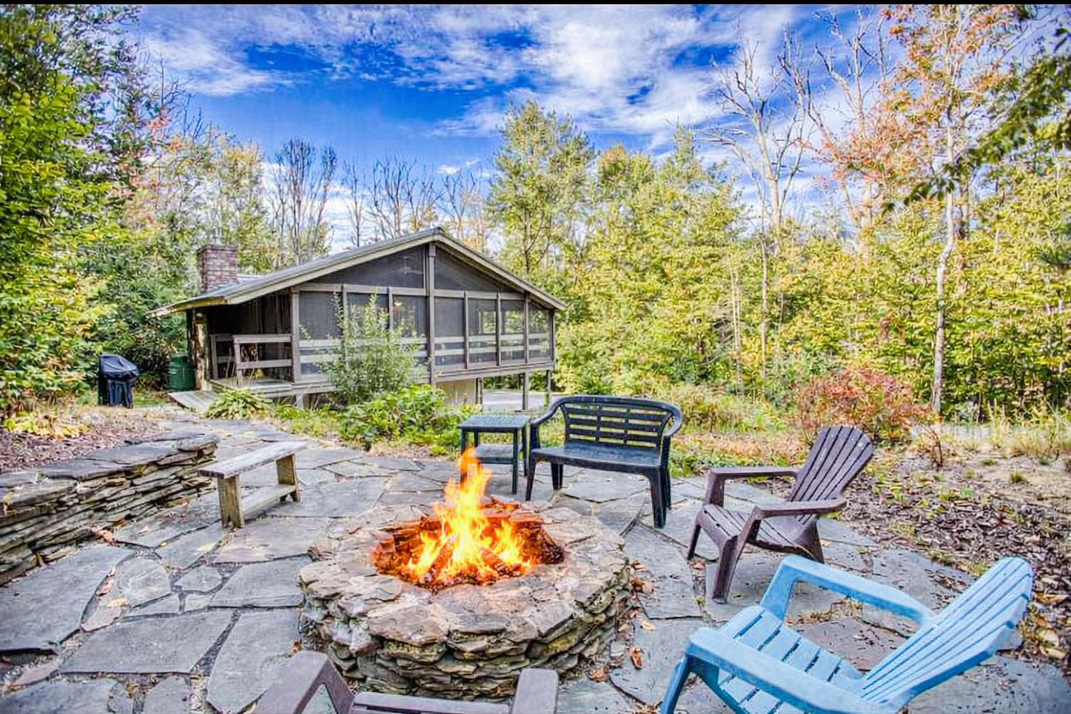 Stone fire pit & patio - Cozy fire pit nights under the trees