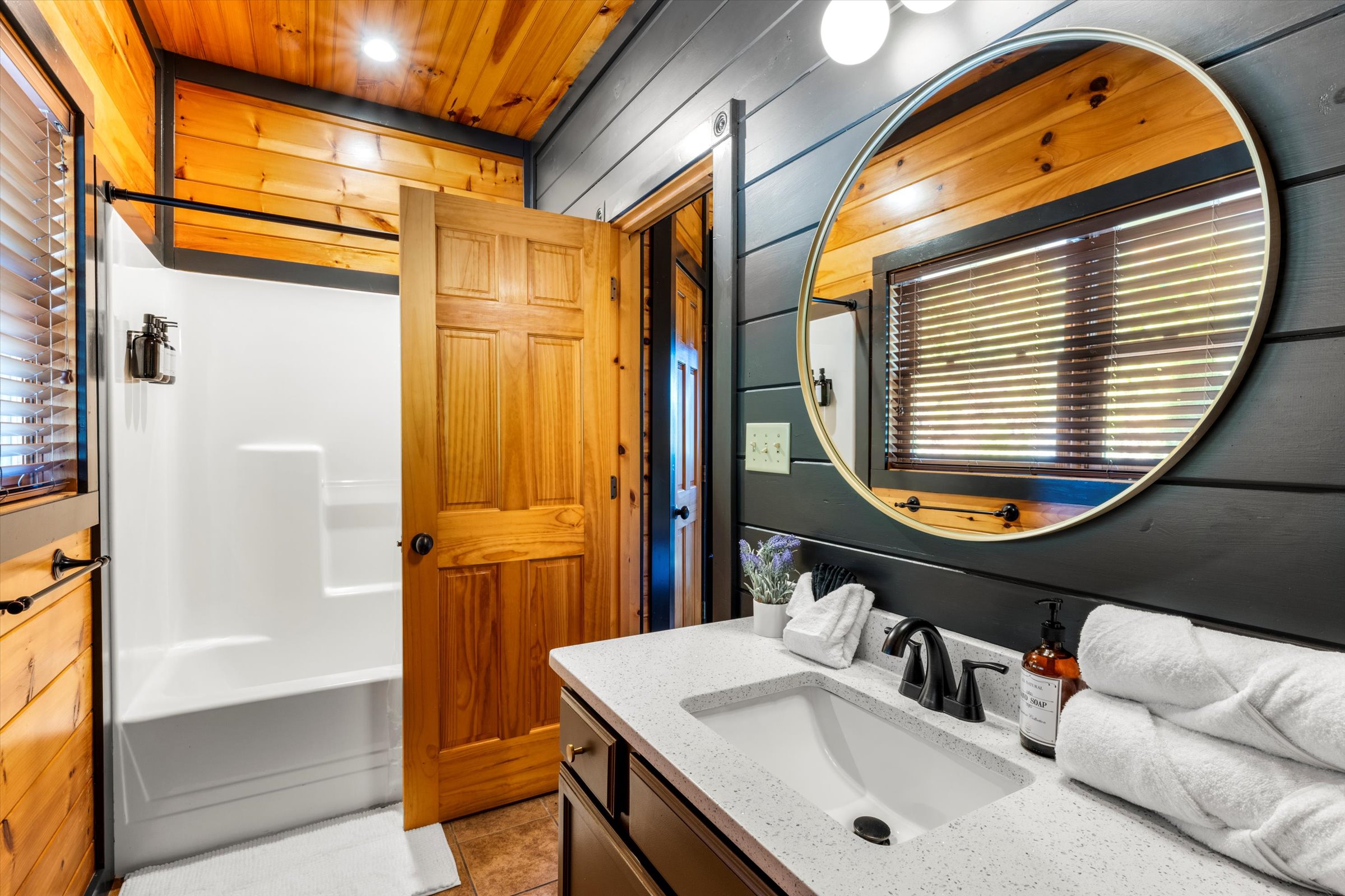 Bedroom 1 has a private bathroom with shower/tub