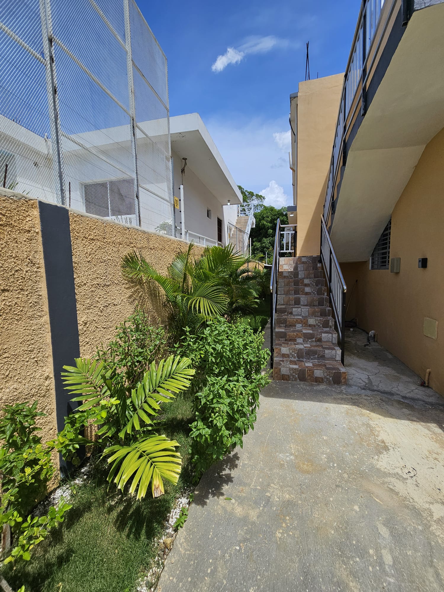 Stairs to 4 bedroom accomodation