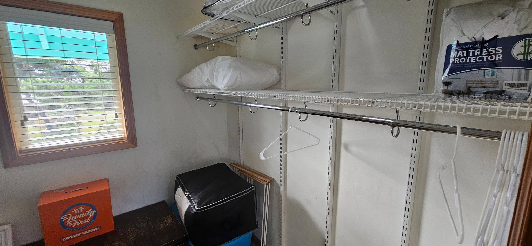 shelves on both sides in upstairs walk in closet