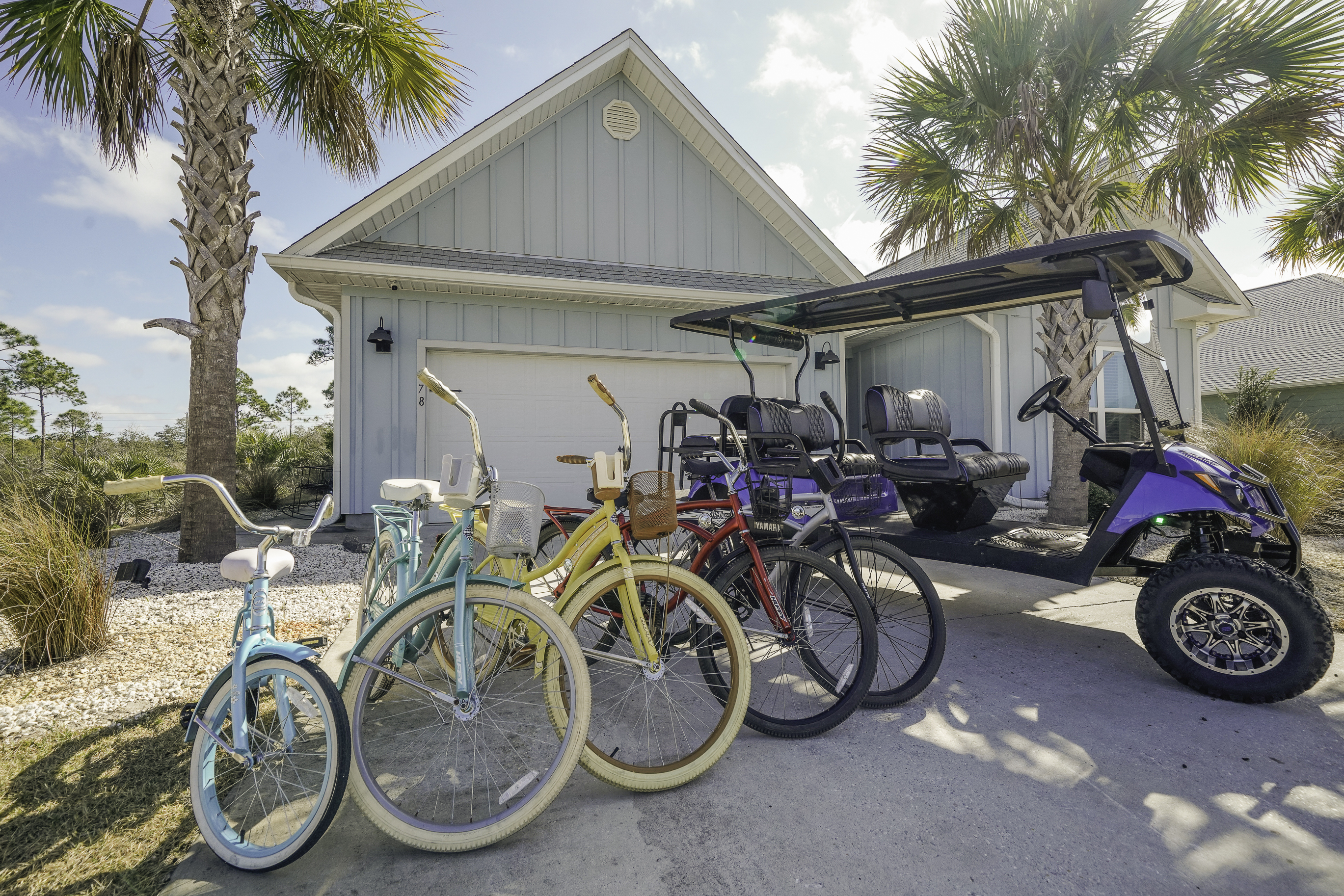 Adventure-ready garage with 6-seater golf cart & Bikes