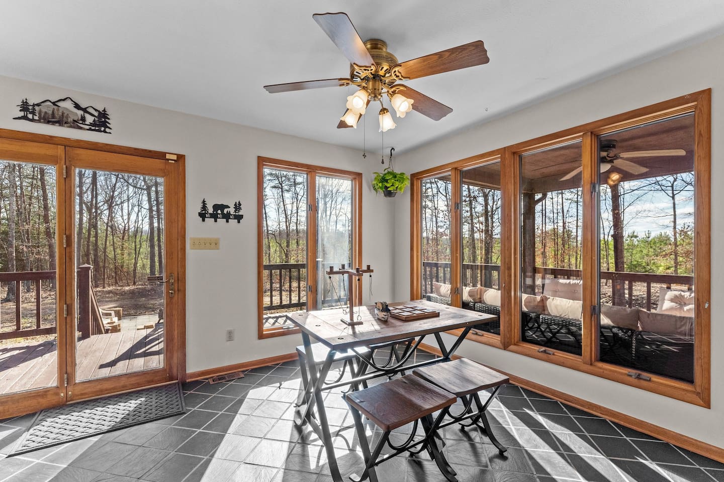 Sunlit Dining Nook: Enjoy meals with a view surrounded by nature's tranquil beauty!