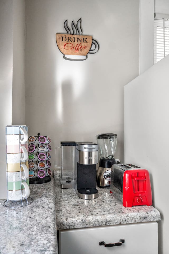 Discover our charming coffee nook, perfect for your morning brew or an afternoon pick-me-up.