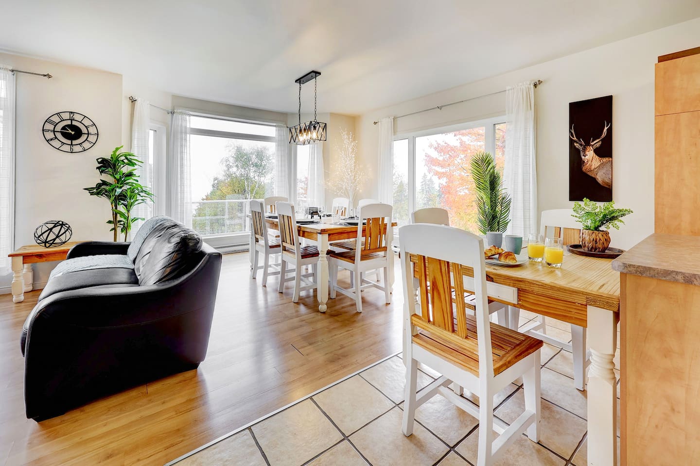 A spacious dining setup featuring two tables for added convenience.