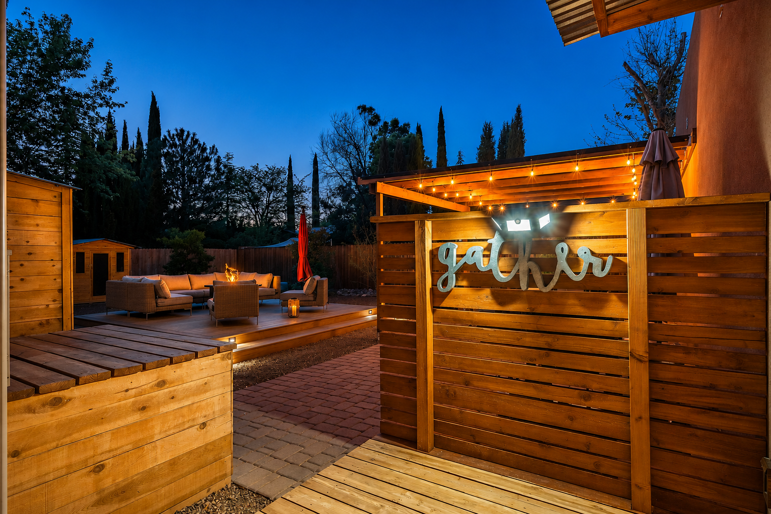 {Outdoor Lounge} Cozy backyard retreat with a fire pit, ambient string lights, and inviting seating made for gathering under the stars.