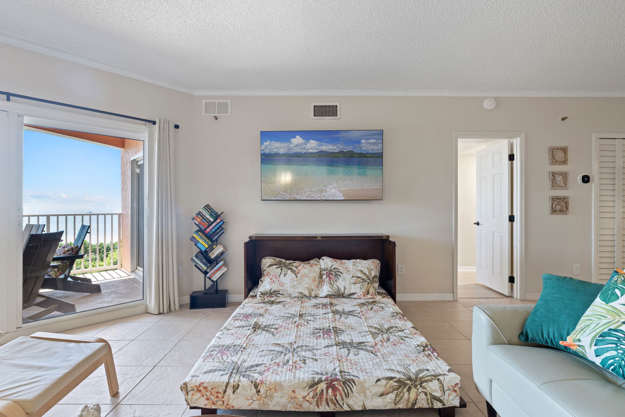 Living Room queen size murphy bed.