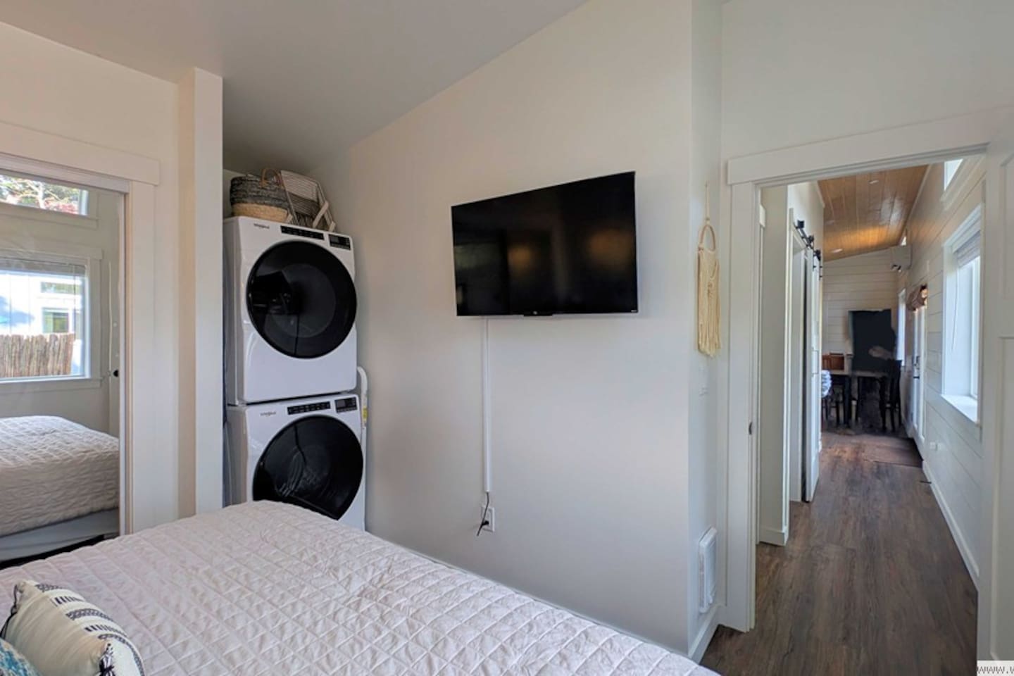 Laundry in primary bedroom