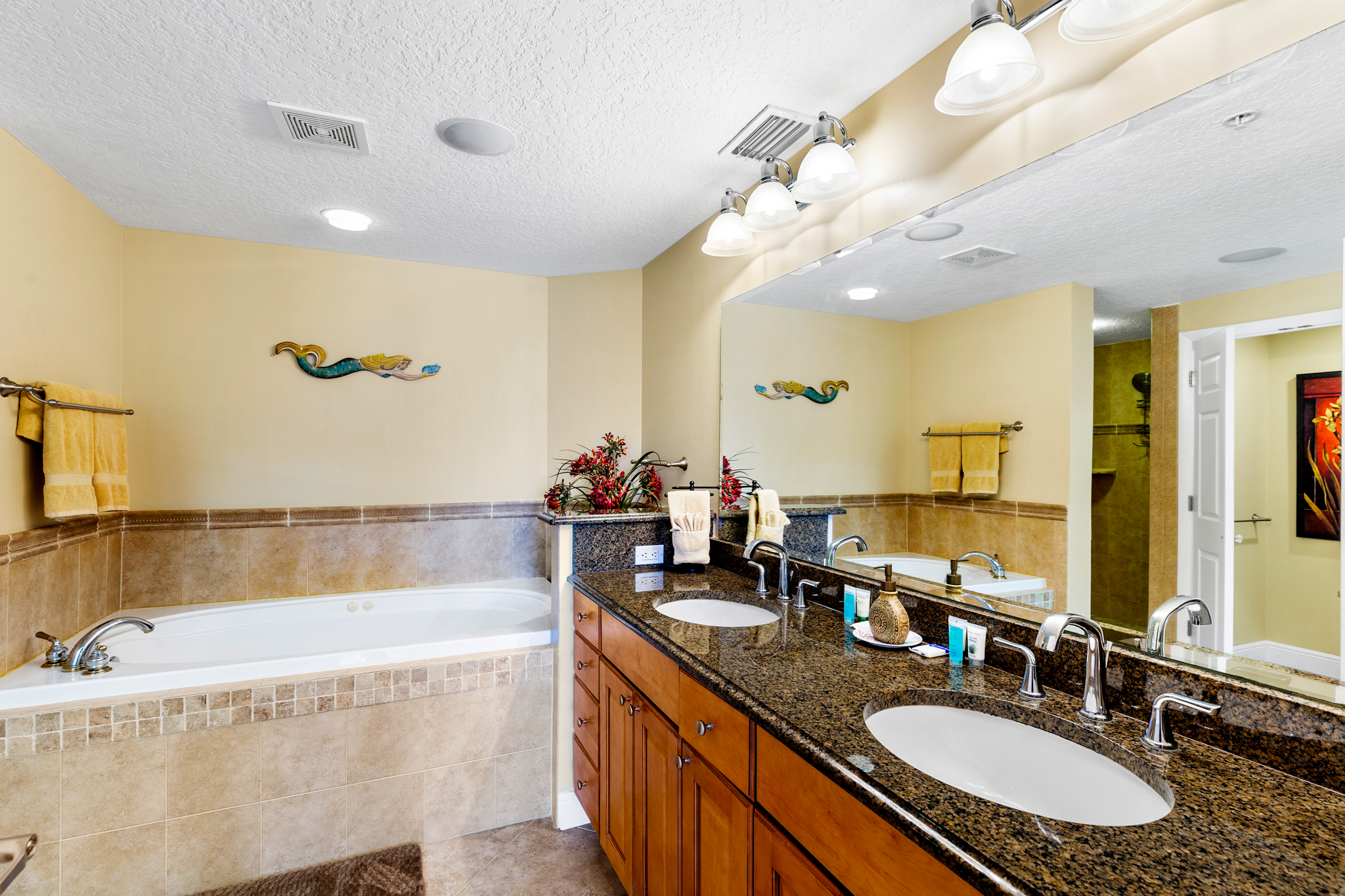 Master bath suite - jacuzzi tub, separate shower,  tile and granite throughout!