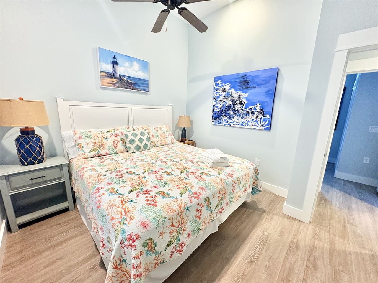 King Bedroom 2 with comfortable furnishings and artwork