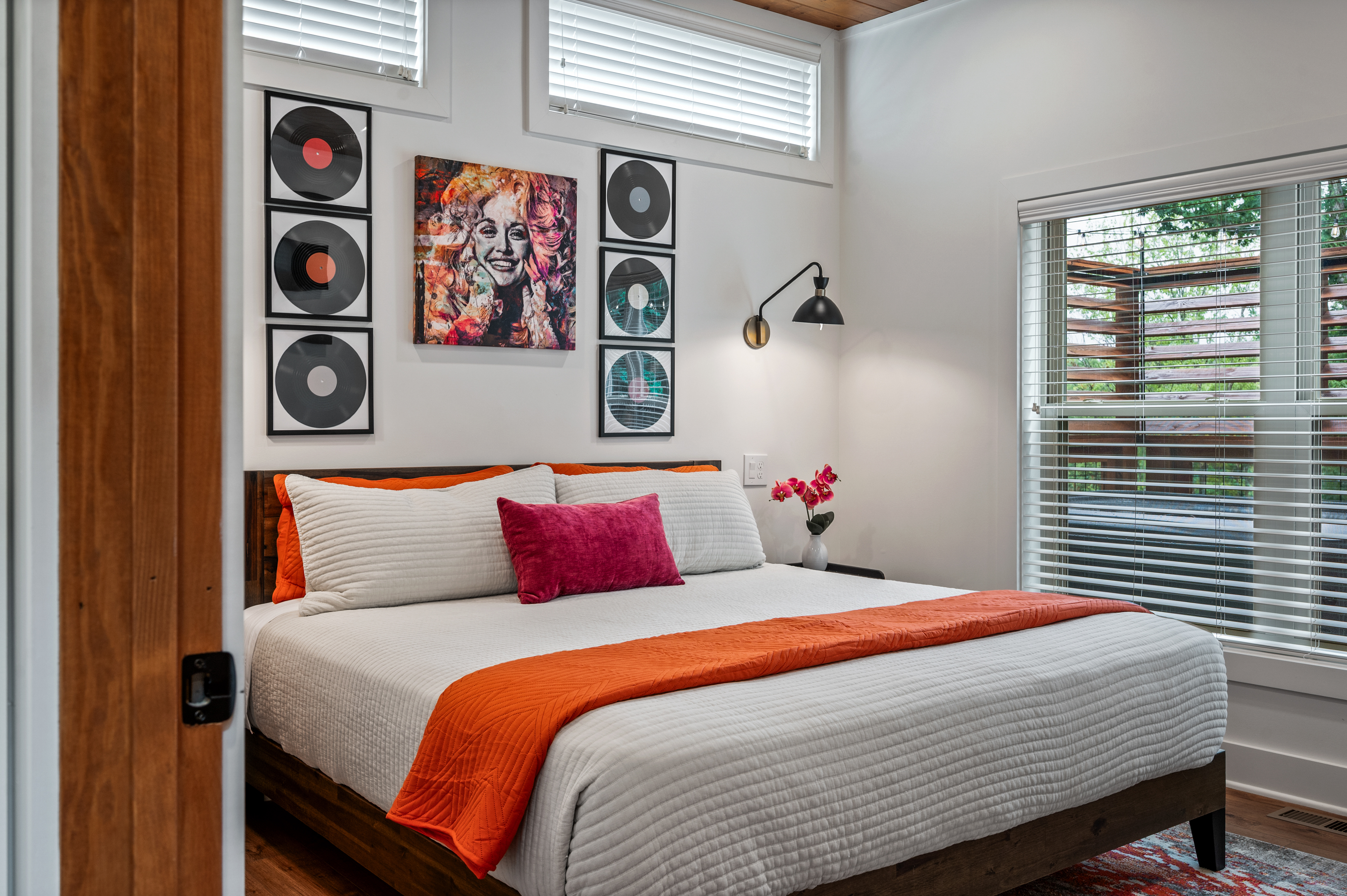 Relax in this main floor King Bedroom, convenient with the bathroom right outside the door and steps from the kitchen.
