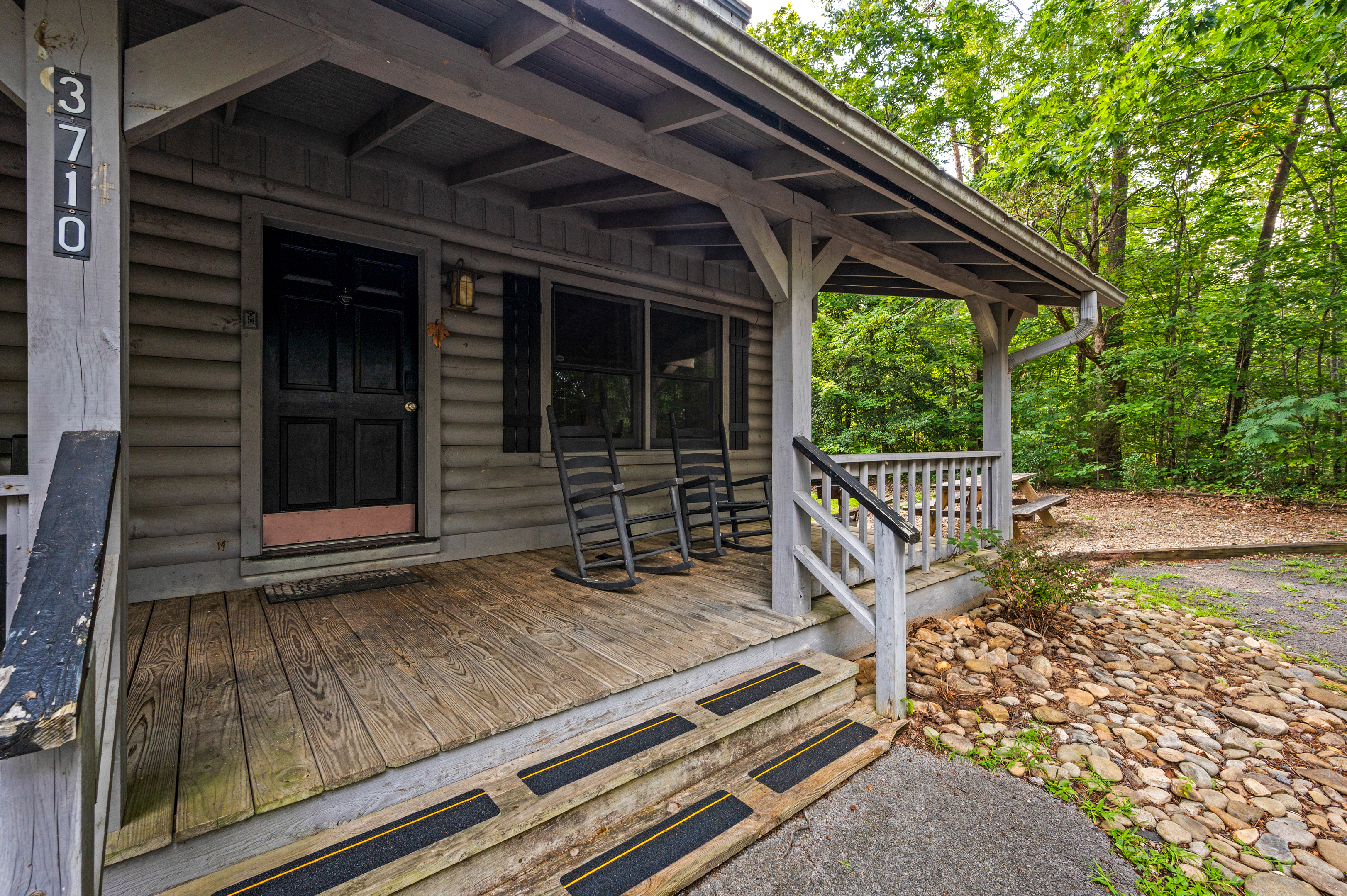 Dog-friendly mountain retreat: enjoy relaxing mornings on the front porch.