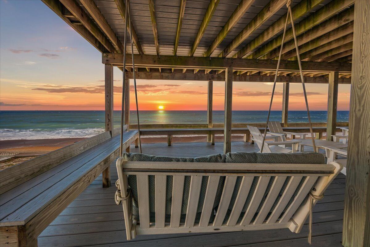 Enjoy a sunrise from the deck swing