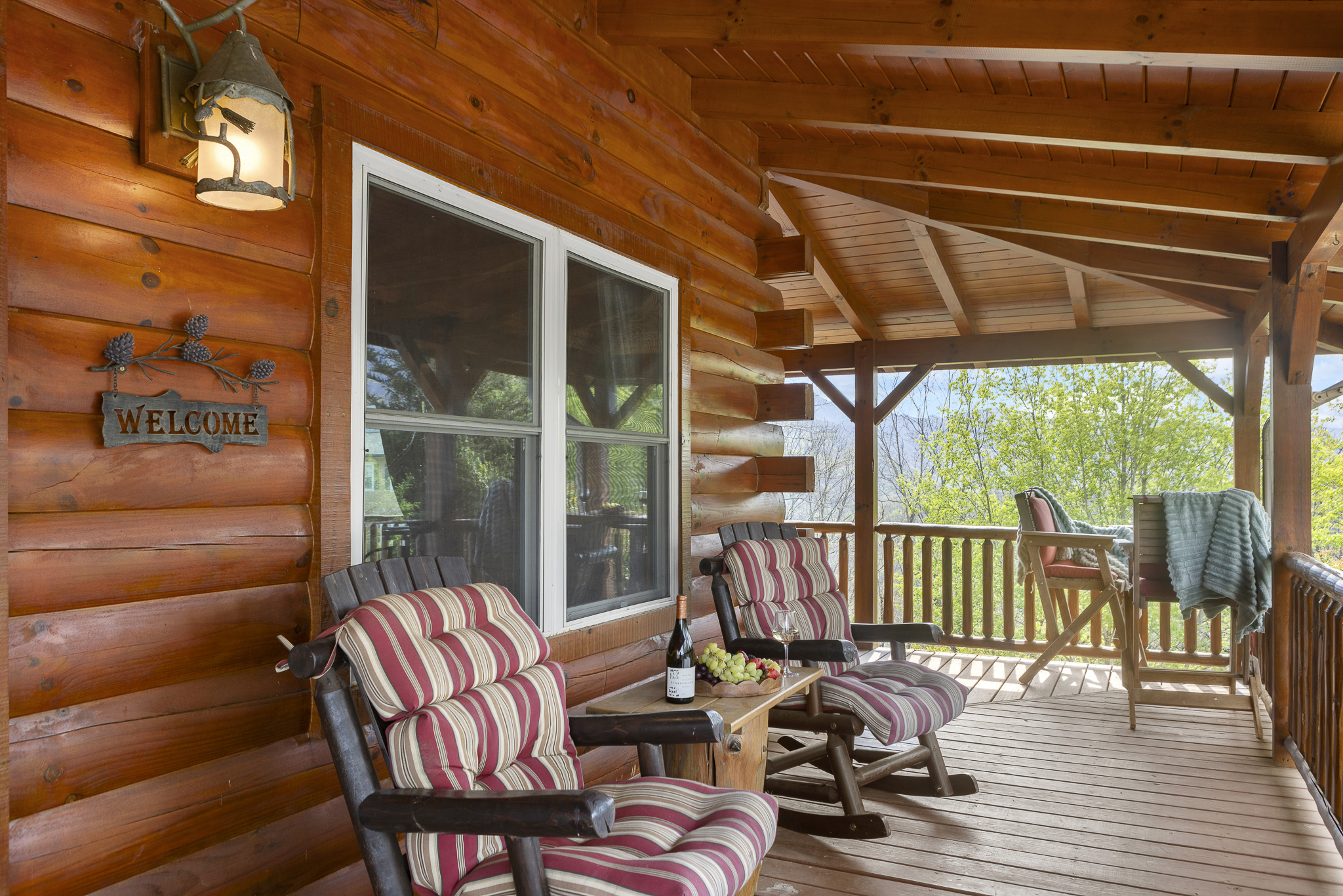 Porch Retreat: Sip wine on the spacious porch, surrounded by nature’s beauty and fresh mountain air!