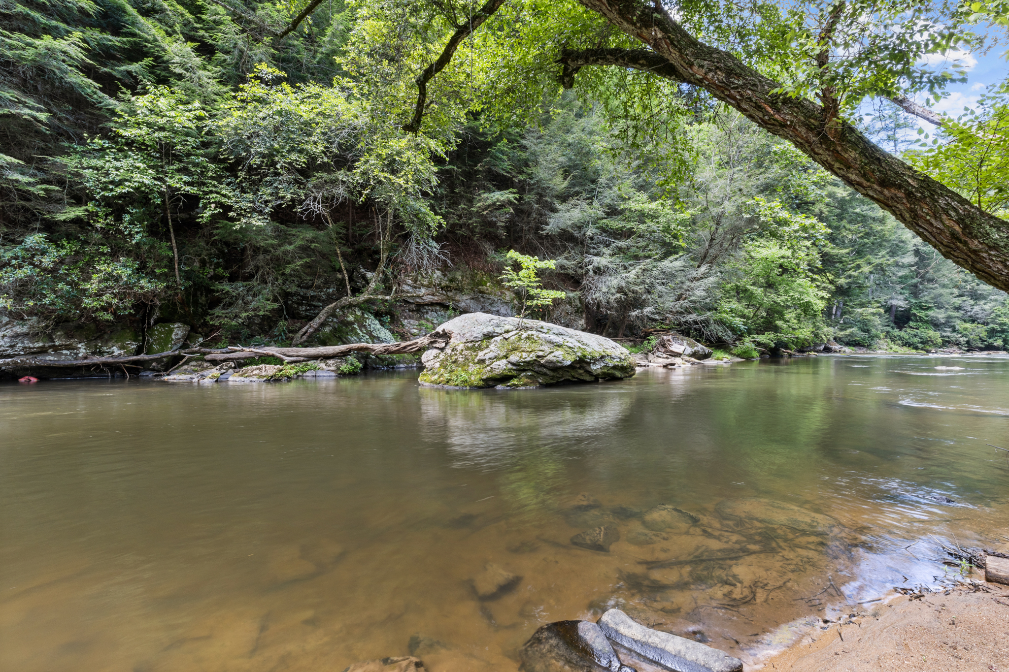 Clear mountain water and natural rock formations create a beautiful place to cool off and explore.